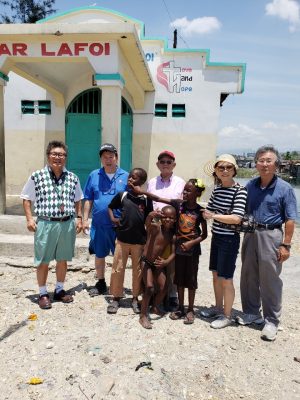 Jesus Medical's staff with Haiti children